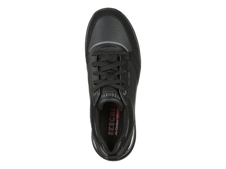 Tenis deportivos Skechers Billion en color negro con detalles perforados y suela gruesa.