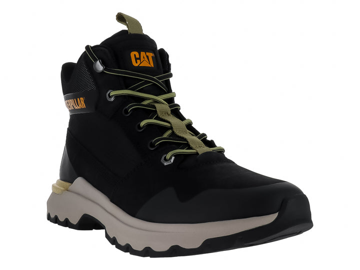 Tenis botín Caterpillar color negro con suela beige y detalles en amarillo.