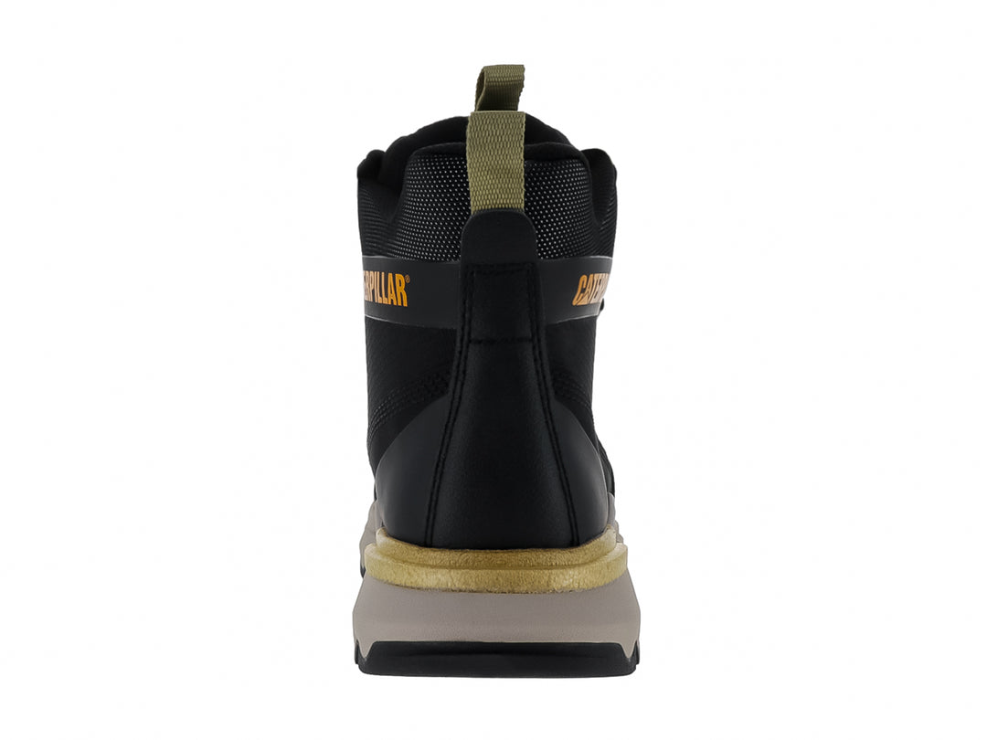 Tenis botín Caterpillar color negro con suela beige y detalles en amarillo.