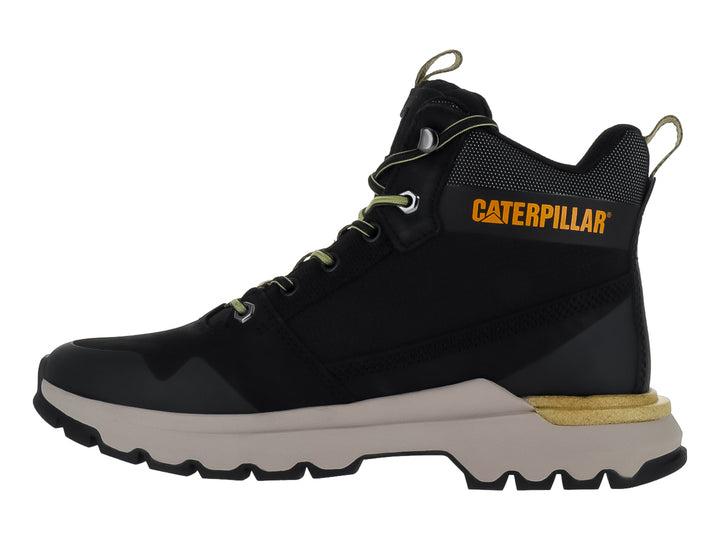 Tenis botín Caterpillar color negro con suela beige y detalles en amarillo.
