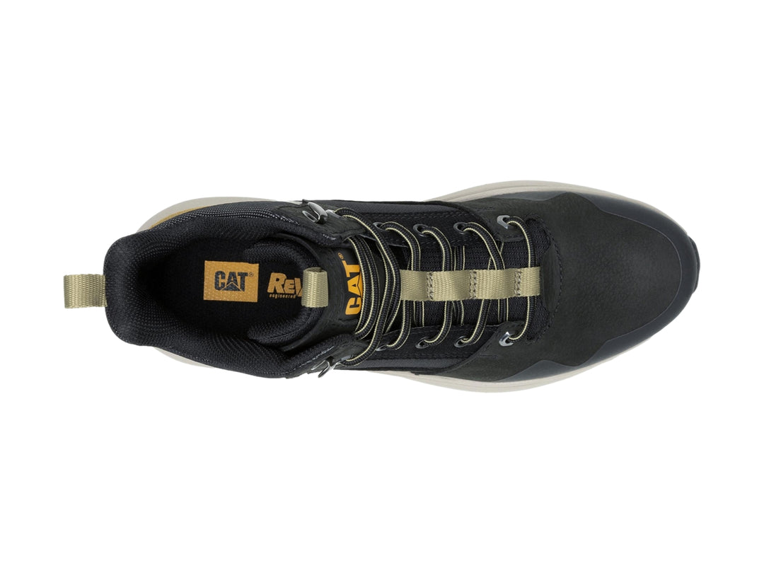 Tenis botín Caterpillar color negro con suela beige y detalles en amarillo.