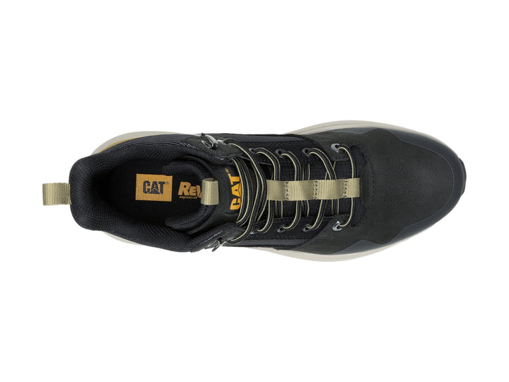 Tenis botín Caterpillar color negro con suela beige y detalles en amarillo.