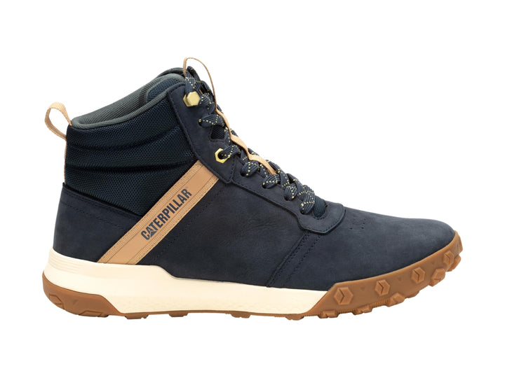 Bota Caterpillar azul oscuro con detalles en café y suela blanca y café para hombre.