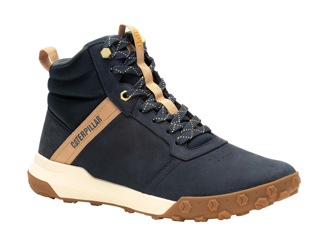 Bota Caterpillar azul oscuro con detalles en café y suela blanca y café para hombre.