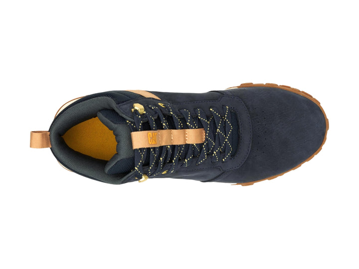 Bota Caterpillar azul oscuro con detalles en café y suela blanca y café para hombre.