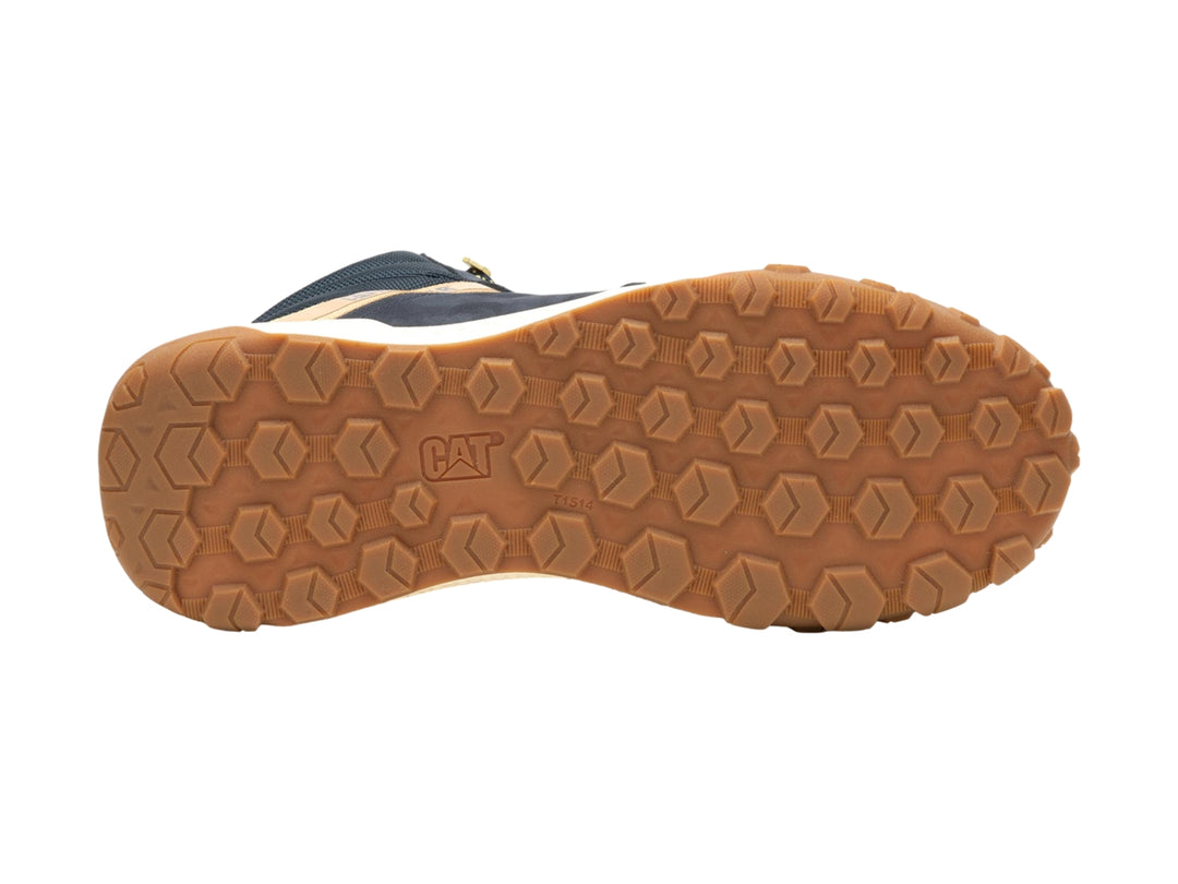 Bota Caterpillar azul oscuro con detalles en café y suela blanca y café para hombre.