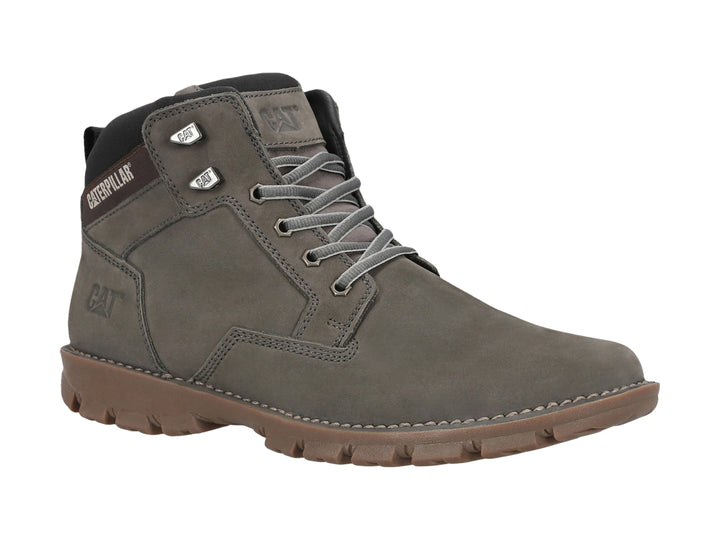 Botín Caterpillar de nubuck color gris con suela marrón y cordones.