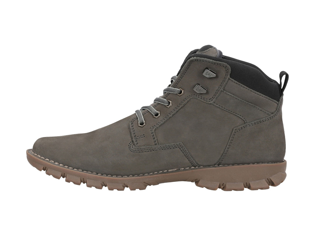 Botín Caterpillar de nubuck color gris con suela marrón y cordones.