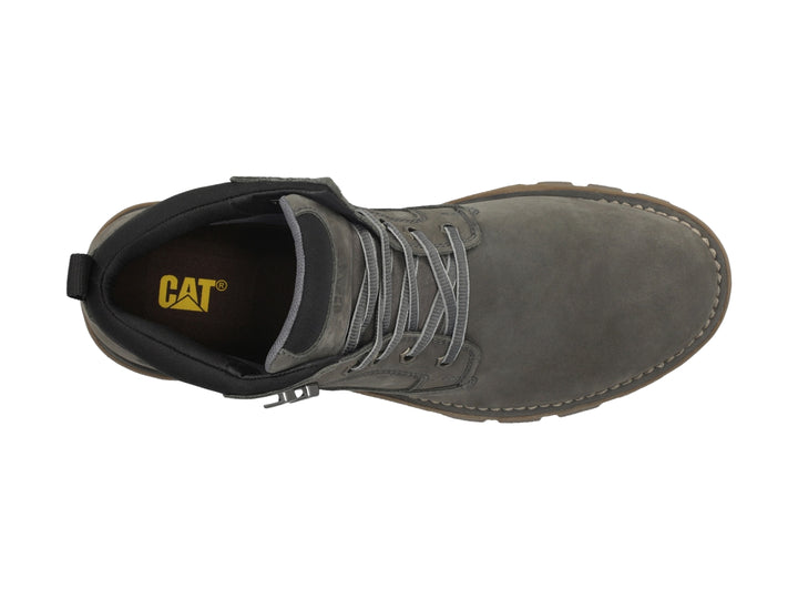 Botín Caterpillar de nubuck color gris con suela marrón y cordones.