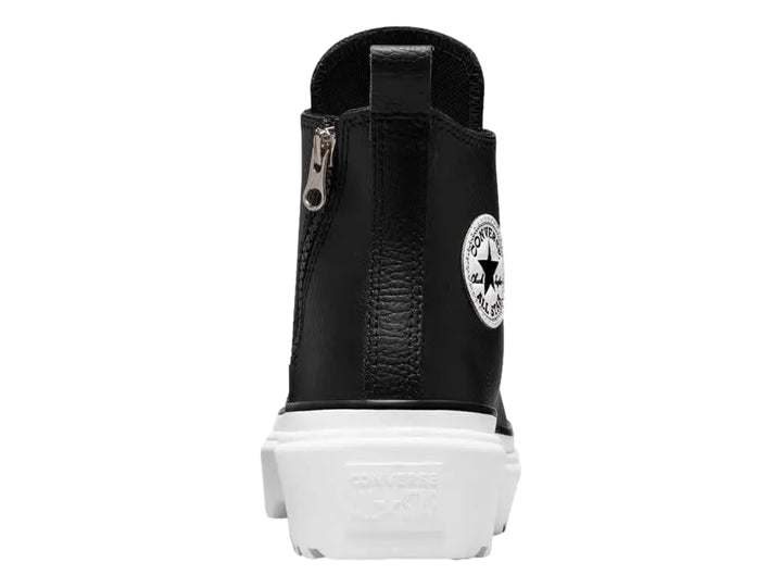 Tenis Converse Chuck Taylor All Star de cuero negro con suela de plataforma blanca gruesa.