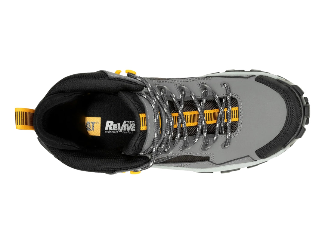 Bota Caterpillar modelo Invader Mid en color gris con detalles en negro y amarillo, diseño robusto para uso casual.