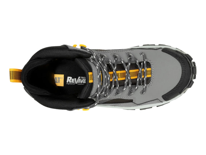 Bota Caterpillar modelo Invader Mid en color gris con detalles en negro y amarillo, diseño robusto para uso casual.