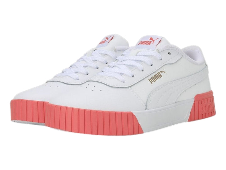 Tenis PUMA Carina 2.0 blancos con suela gruesa en color rosa hibisco.