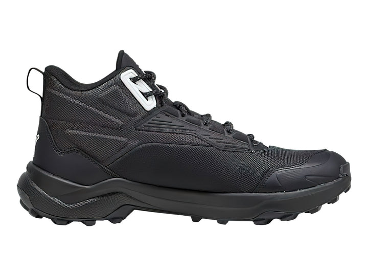 Tenis deportivos PUMA de corte medio en color negro con detalles en blanco y suela robusta.