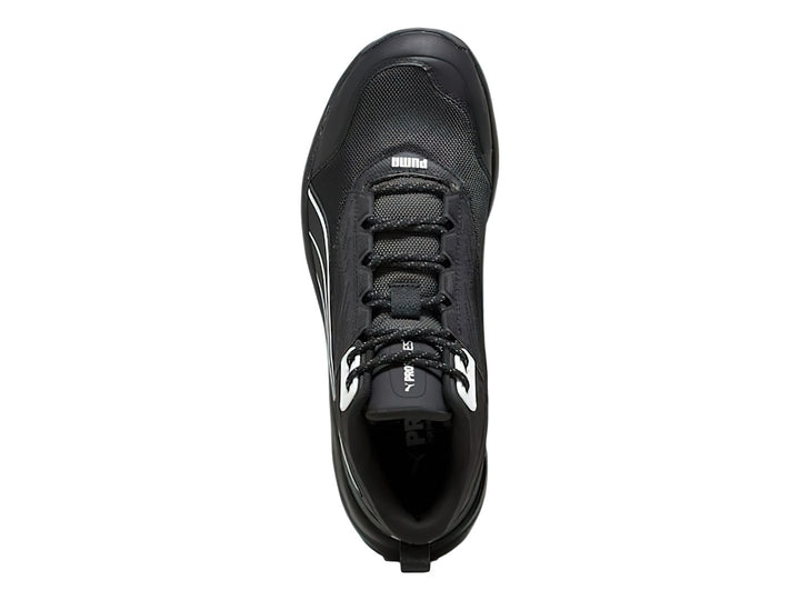 Tenis deportivos PUMA de corte medio en color negro con detalles en blanco y suela robusta.