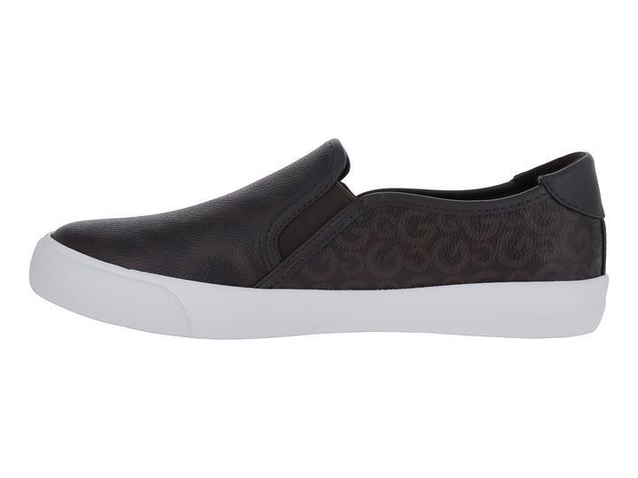 Zapato estilo slip-on color chocolate con estampado, suela blanca y detalle dorado en el lateral.