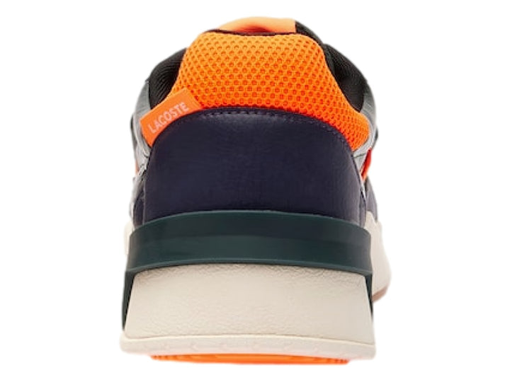 Tenis deportivos Lacoste en colores verde, azul oscuro y naranja con suela blanca.