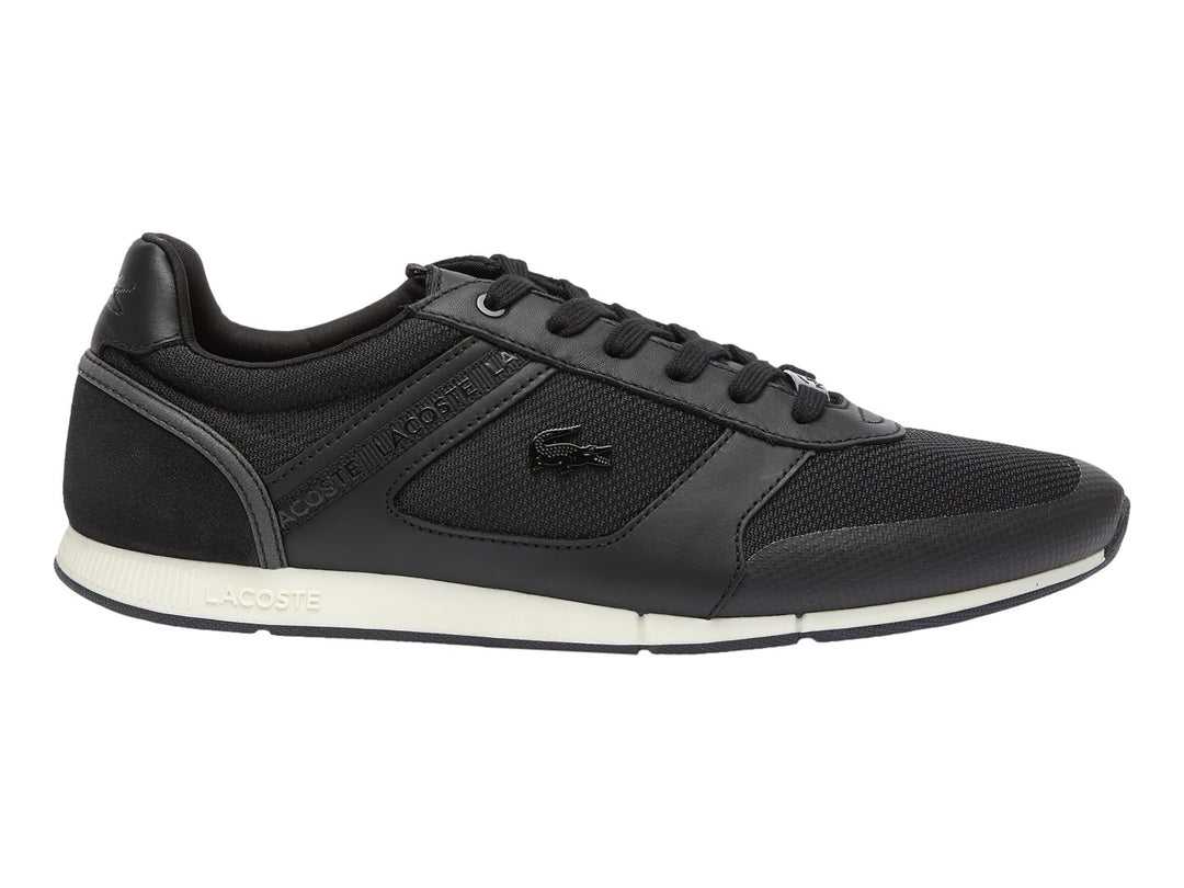 Tenis deportivos Lacoste en color negro con suela blanca y detalles en malla.