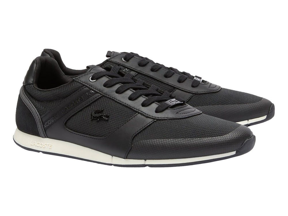 Tenis deportivos Lacoste en color negro con suela blanca y detalles en malla.