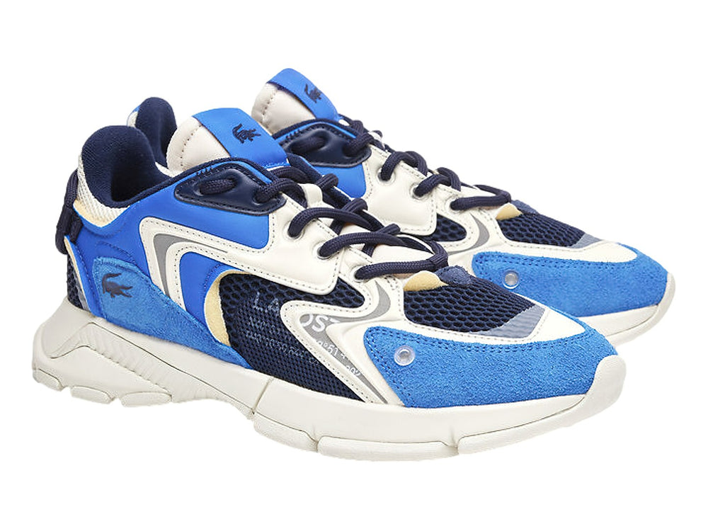 Tenis deportivos Lacoste en colores azul, navy y blanco con suela robusta y detalles en malla.