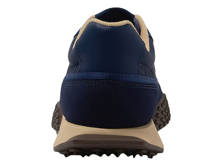 Tenis Lacoste L-Spin Deluxe en color azul marino con detalles en blanco y suela beige.