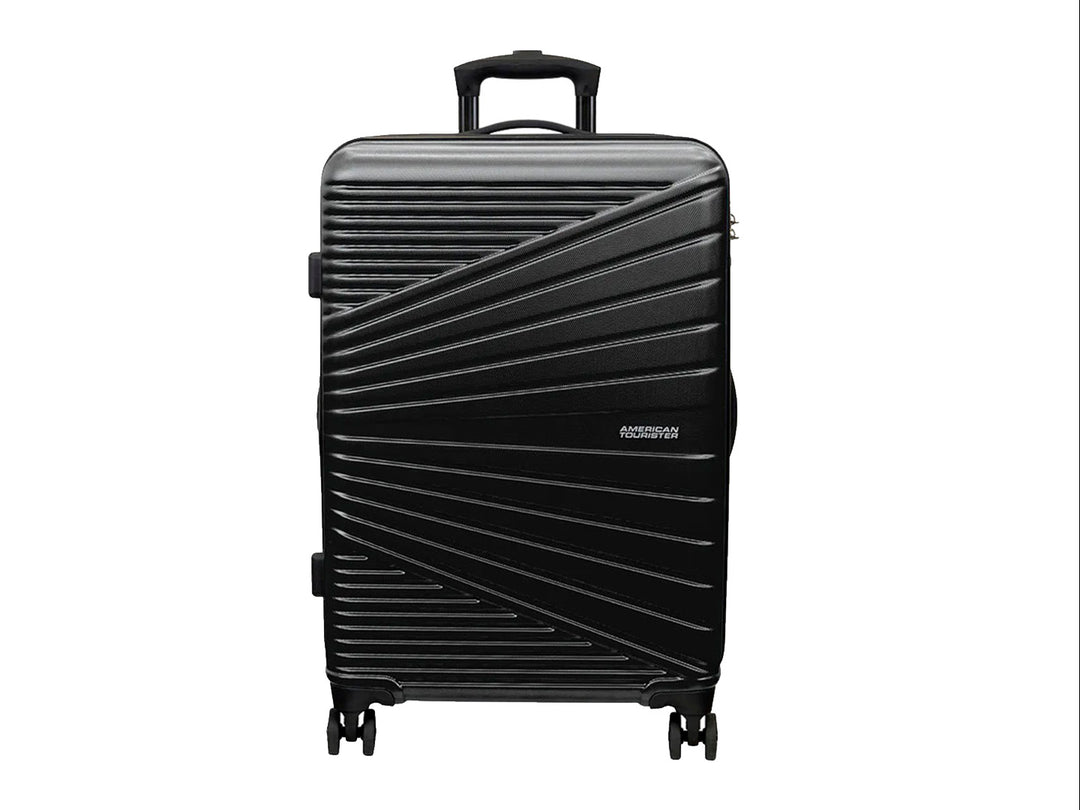 Maleta de equipaje rígida Samsonite color negro con diseño de líneas diagonales y ruedas spinner.