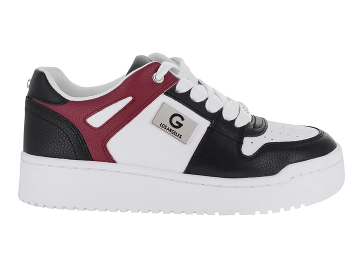 Tenis casuales para niño en colores blanco, negro y rojo cereza con suela blanca gruesa.