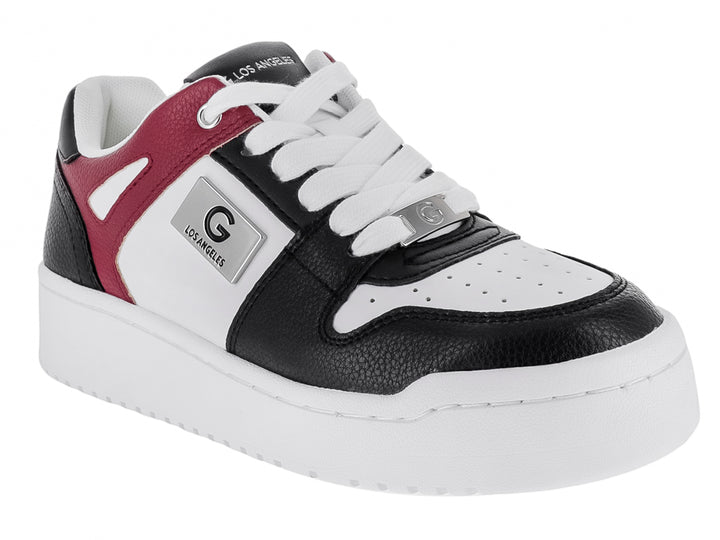 Tenis casuales para niño en colores blanco, negro y rojo cereza con suela blanca gruesa.