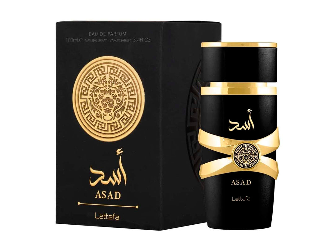 Perfume Lattafa Asad en frasco negro con detalles dorados y su caja negra coordinada.