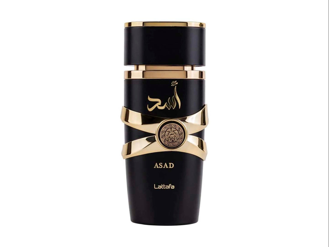 Perfume Lattafa Asad en frasco negro con detalles dorados y su caja negra coordinada.
