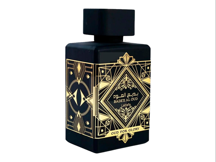 Perfume Lattafa Badee Al Oud For Glory en botella negra con detalles dorados y su caja protectora.