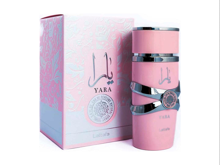 Perfume Lattafa Yara en frasco cilíndrico color rosa con detalles plateados y su caja decorada a juego.