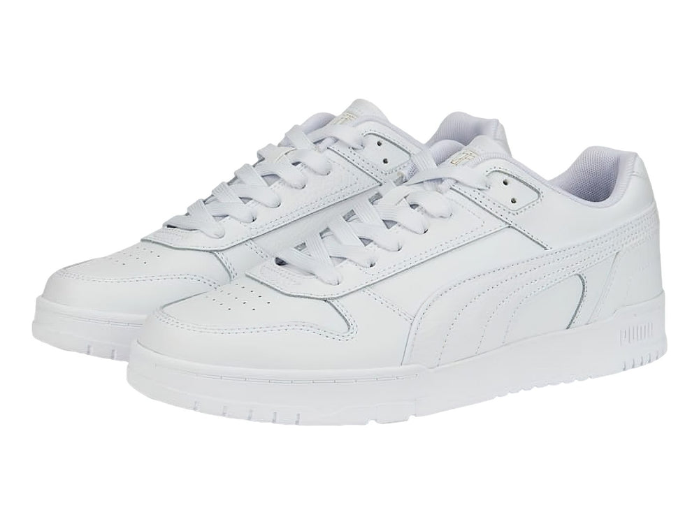 Tenis PUMA RBD Game Low en color blanco total, diseño deportivo de corte bajo con cordones.