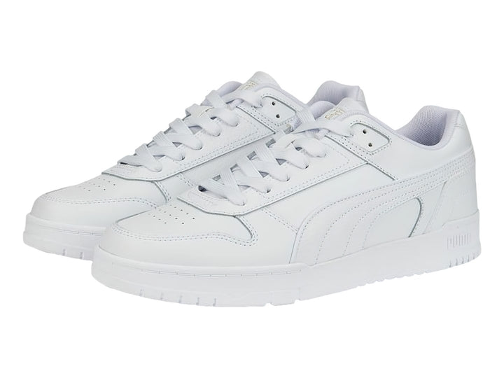 Tenis PUMA RBD Game Low en color blanco total, diseño deportivo de corte bajo con cordones.