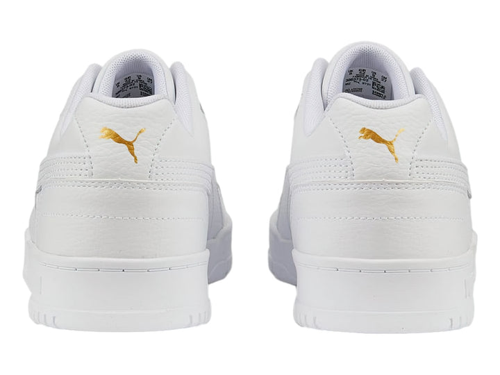 Tenis PUMA RBD Game Low en color blanco total, diseño deportivo de corte bajo con cordones.