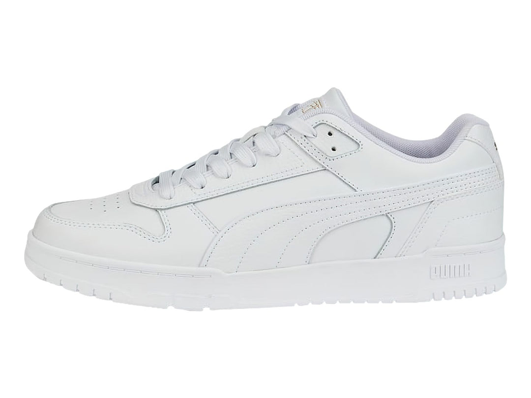 Tenis PUMA RBD Game Low en color blanco total, diseño deportivo de corte bajo con cordones.
