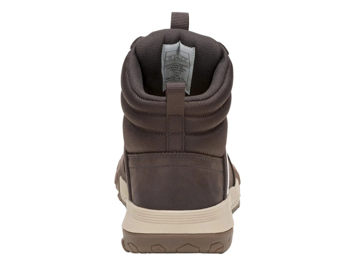 Botín Caterpillar color café oscuro con suela beige, diseño resistente e impermeable para deporte o trabajo.
