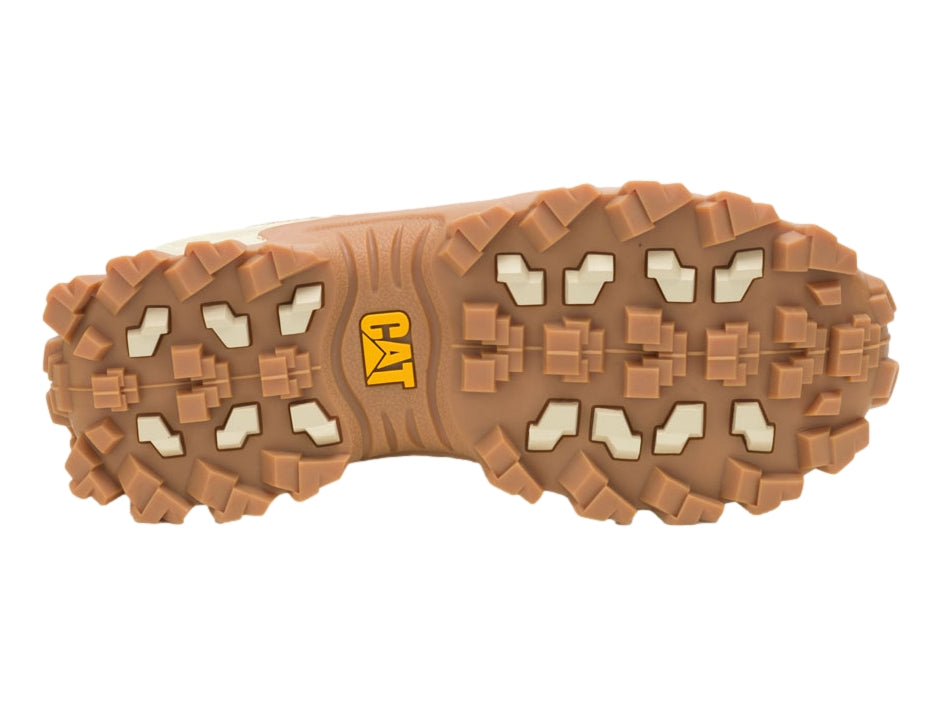 Tenis Caterpillar color marrón y azul marino con suela gruesa y robusta.