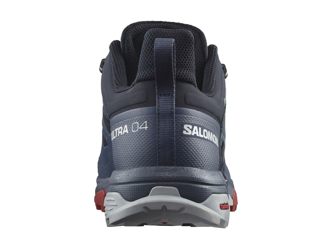 Zapato de senderismo Salomon X Ultra 4 GTX en color azul marino con detalles en gris y rojo.