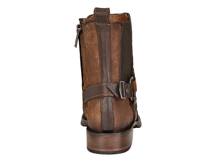 Bota de cuero color castaño con punta de piel de pitón y detalles de hebillas metálicas.