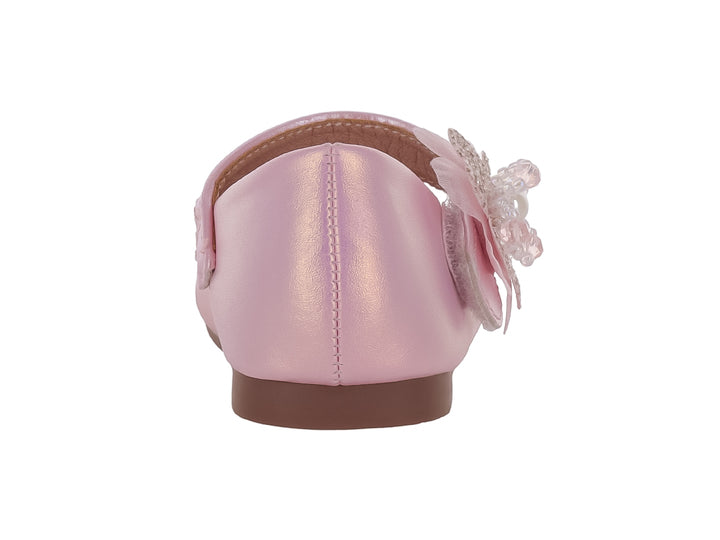 Zapato plano rosa brillante para niña con adorno de flor y perla.