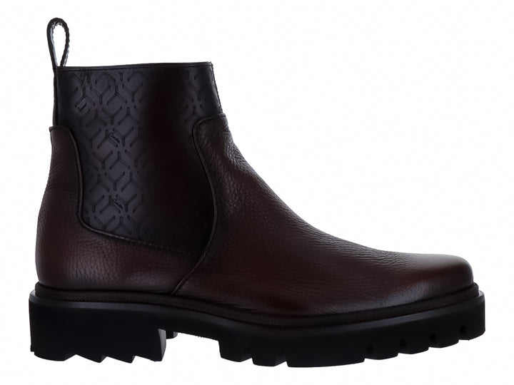 Bota de cuero color nuez con suela negra gruesa y dentada, diseño casual para Hombre.