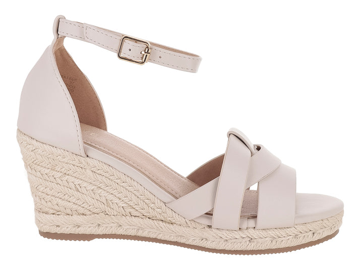 Sandalia de cuña color off white con plataforma trenzada y correa al tobillo.