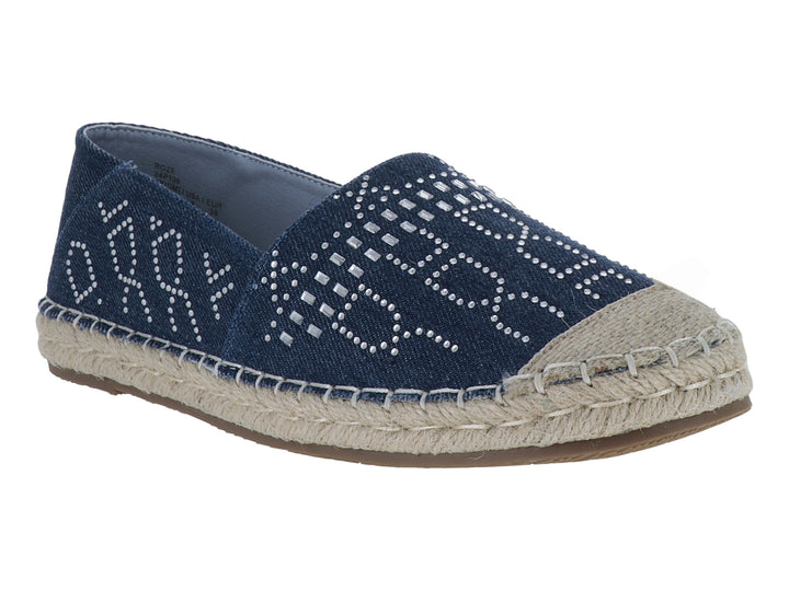 Zapato tipo alpargata color azul marino con detalles brillantes y suela de yute beige.