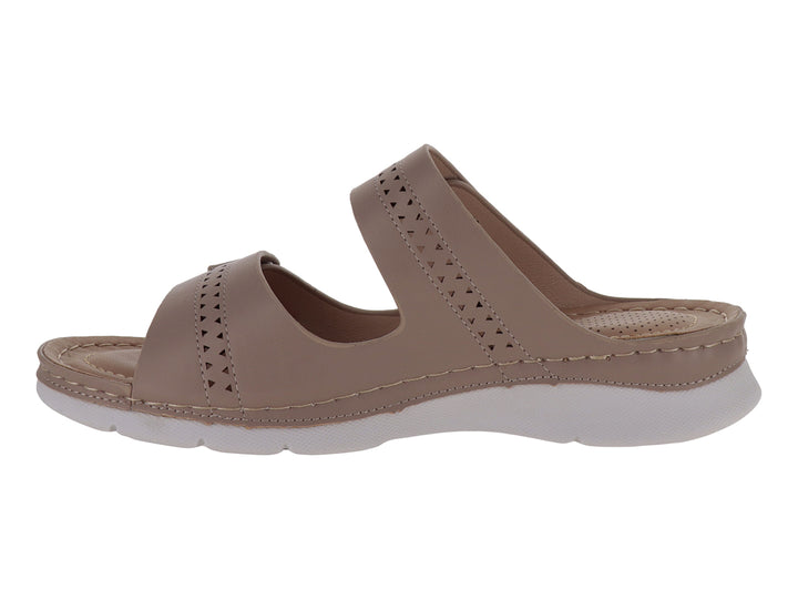 Sandalia color beige para niña con dos correas ajustables y suela blanca.