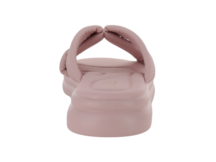Sandalia ROZE color rosa con tiras acolchadas cruzadas y suela de plataforma ancha.