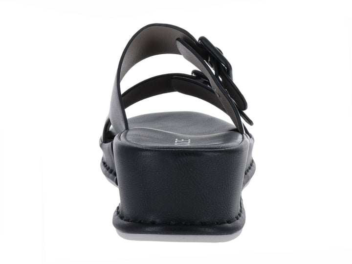 Sandalia de plataforma color negro con dos correas ajustables con hebillas plateadas.