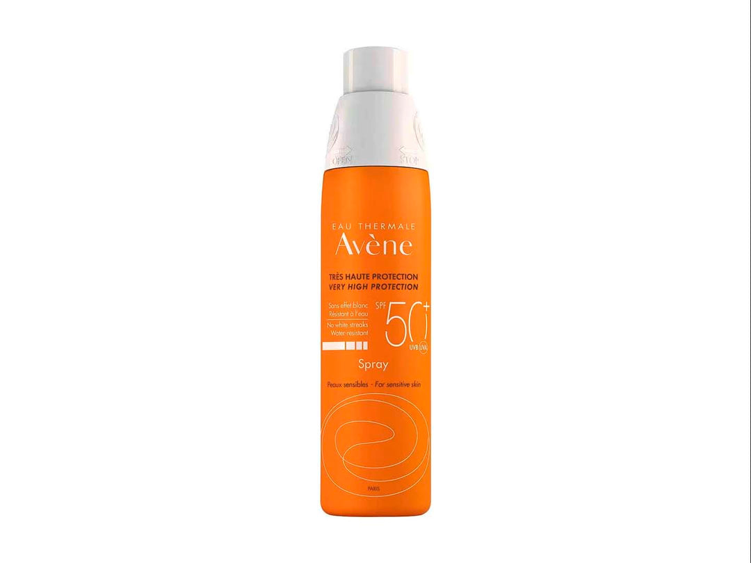 Envase spray de protector solar Avène SPF 50+ en color naranja con tapa blanca.