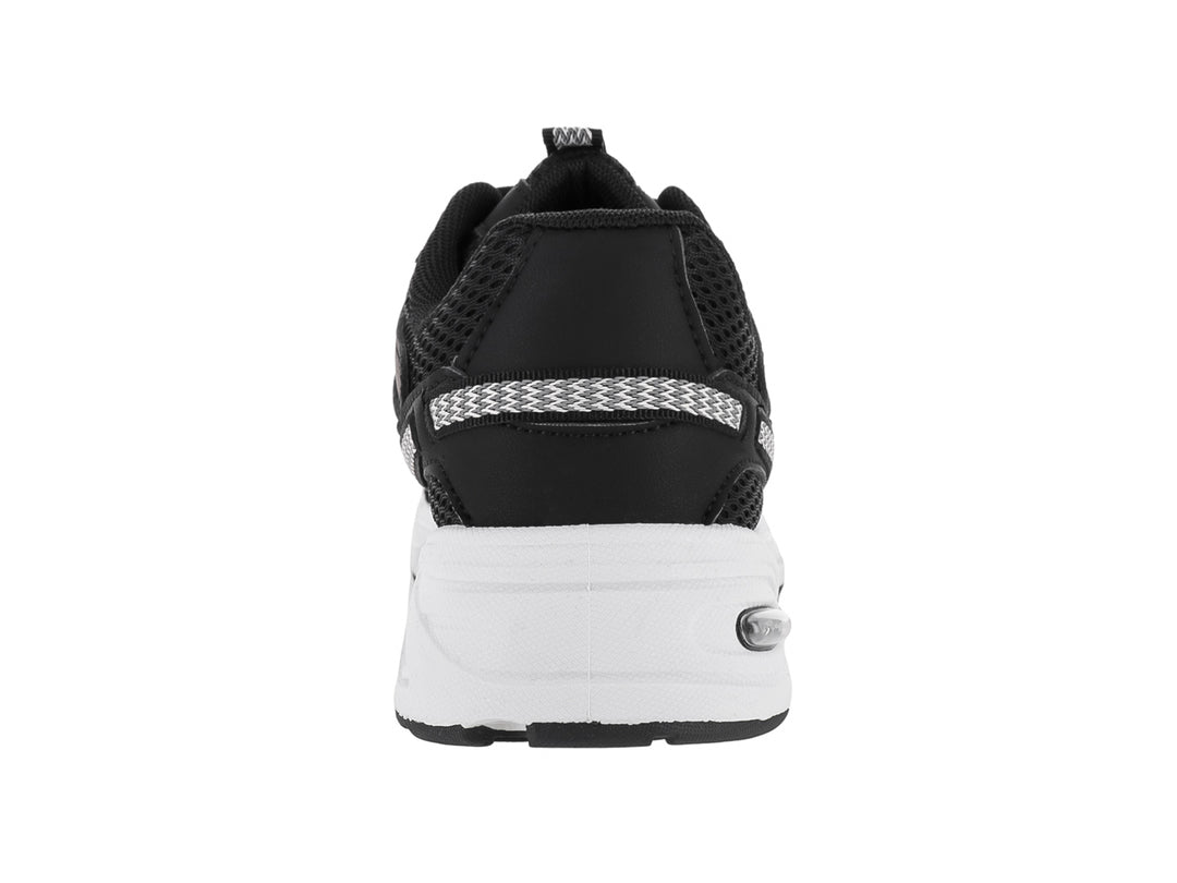 Tenis deportivos ATOK en color negro con detalles en gris y suela blanca gruesa.