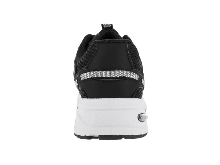 Tenis deportivos ATOK en color negro con detalles en gris y suela blanca gruesa.
